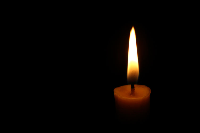 40776907 - one candle flame at night closeup