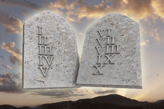 44507029 - the ten commandments on a sunset background