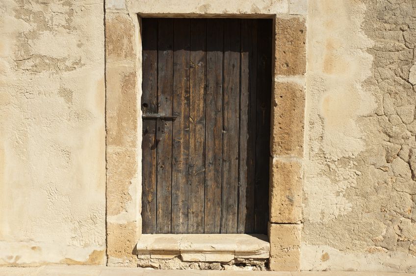 16442308 - wooden door in a mediterranean castle